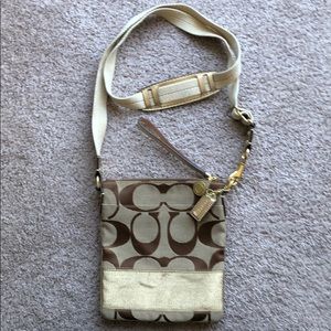 Coach signature strip gold cross body bag